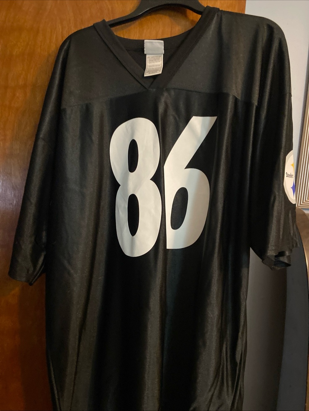 NFL Black Team Apparel Tag with White Label and Red Logo